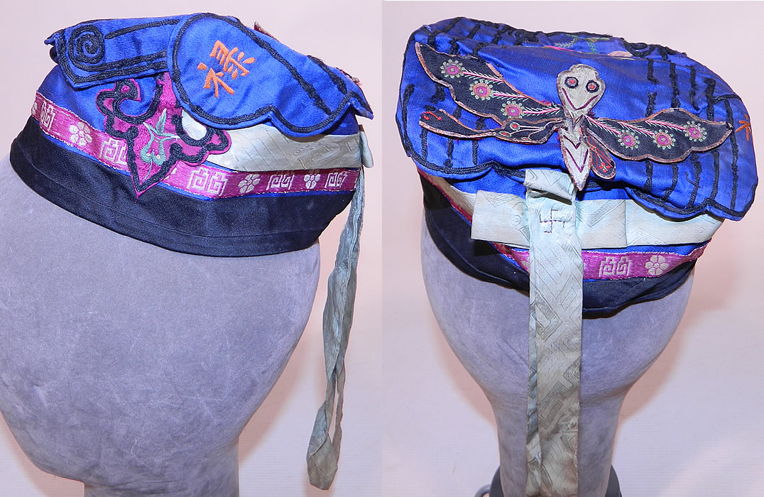 Antique Chinese Child Infant Silk Embroidered Butterfly Wind Hat Cap
The lotus flower is a symbol of purity and the butterfly represents beauty, long life. There is a blue silk ribbon hanging down the back with a stitched swastika the Chinese character for longevity. 