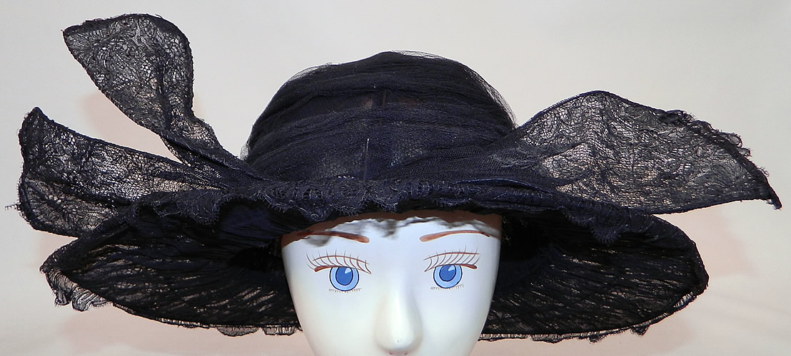 Vintage Black Chantilly Lace Wired Wing Trim Wide Brim Cloche Hat
It is made of a wired frame covered with a sheer black net fabric and fine black chantilly lace. 