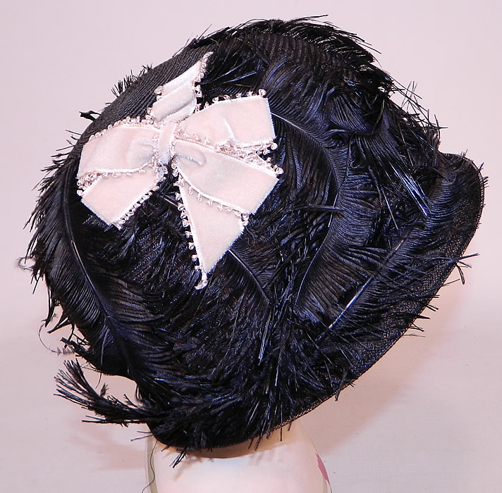 Vintage Black Feather Woven Horse Hair Straw Flapper Cloche Hat
This fabulous flapper cloche style hat has a form fitting style, with a slight small brim and is sheer, completely unlined. 