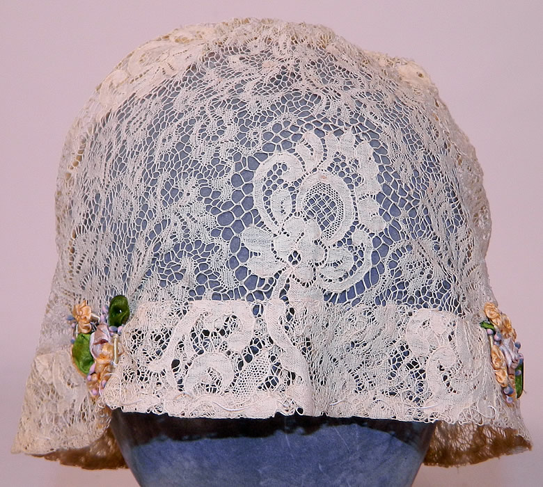 Vintage Lace Silk Rosette Trim Floral Flapper Boudoir Bed Cap Cloche Hat
This vintage lace silk rosette trim floral flapper boudoir bed cap cloche hat dates from the 1920s.