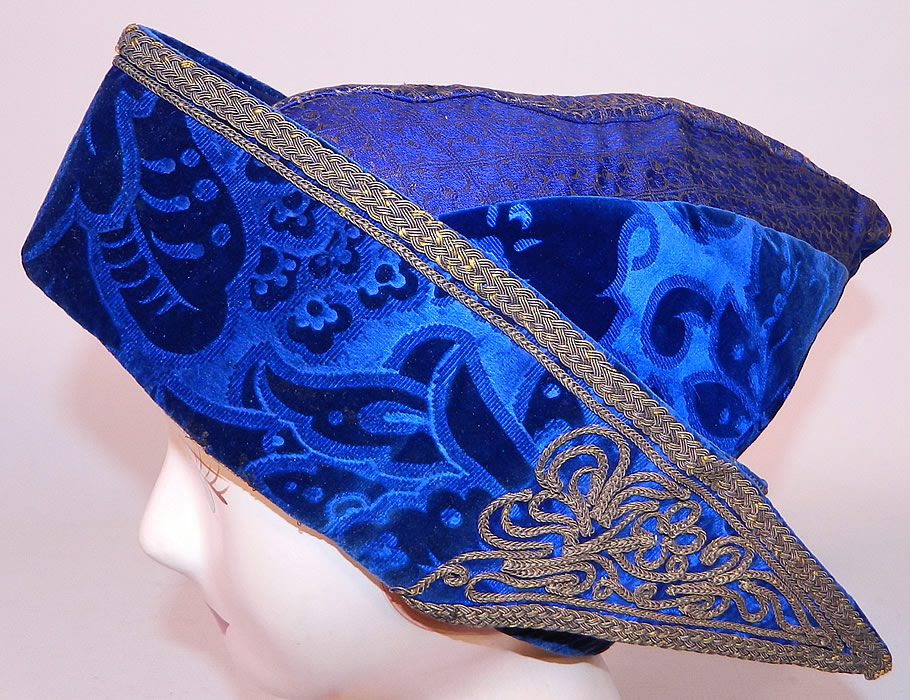 Vintage Hungary Regional Folk Costume Blue Burnout Voided Velvet Gold Trim Cap Archers Hat
This antique vintage Hungary regional folk costume blue burnout voided velvet gold trim cap archers hat dates from the late 19th century.