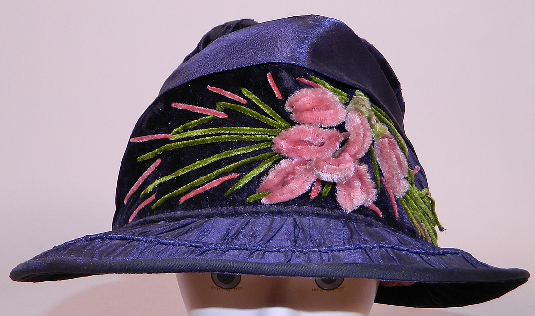 Vintage Periwinkle Silk Velvet Wide Brim Chenille Embroidered Flower Flapper Cloche Hat
This vintage periwinkle silk velvet wide brim chenille embroidered flower flapper cloche hat dates from the 1920s.
