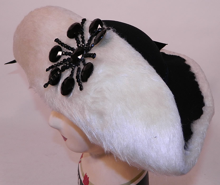 Vintage Leon Hats NY Label Black & White Felt Fur Jet Beaded Trim Tricorn Hat
This vintage Leon Hats New York label black and white felt fur jet beaded trim tricorn hat dates from the 1940s.