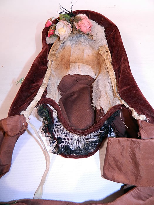 Victorian Civil War Brown Velvet Silk Roses Black Chantilly Lace Trim Drawn Spoon Bonnet.
 It is in good condition, with only some minor wear and yellowing discoloration staining inside on the lining. This is truly a wonderful piece of wearable Victoriana millinery art! 