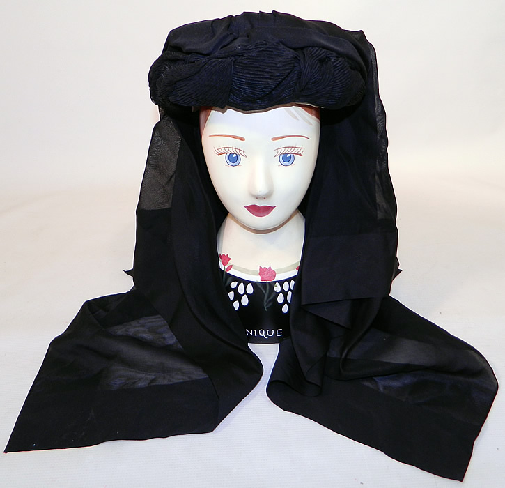 Victorian C.F. Hovey & Co Boston Label Black Silk Crepe Veil Full Mourning Bonnet Hat
This antique Victorian Civil War era C.F. Hovey & Co. Boston label black silk crepe veil full mourning bonnet hat dates from the 1860s.