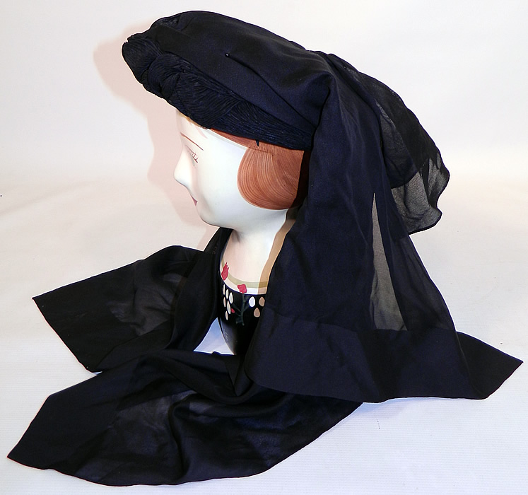 Victorian C.F. Hovey & Co Boston Label Black Silk Crepe Veil Full Mourning Bonnet Hat
The bonnet measures 20 inches in circumference around the face and has a 30 inch long veil. 