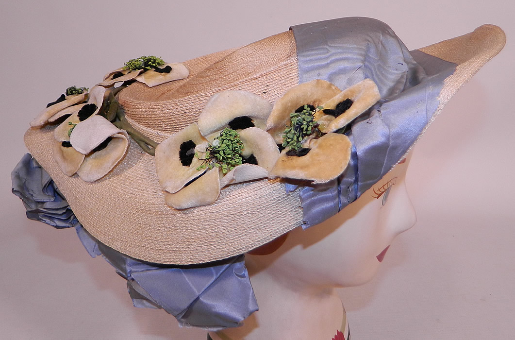 Victorian White Woven Straw Blue Silk Ribbon Floral Trim Wide Brim Gainsborough Hat
This gorgeous Gainsborough style summer plate hat has a wide upturned brim with blue silk ribbon lining trim underneath and a low round crown on top. 