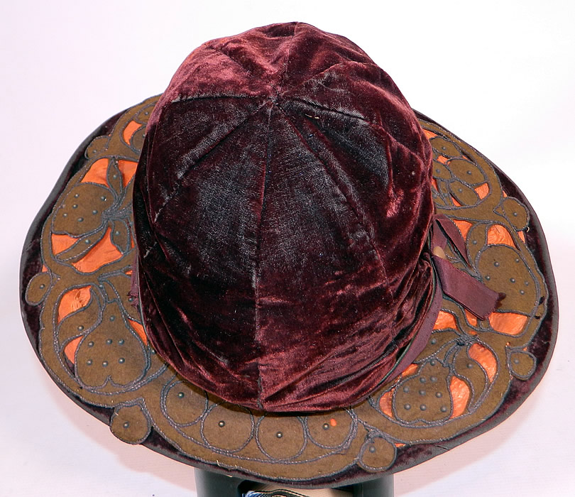 Vintage Burgundy Velvet Orange Silk Brown Cutwork Beaded Trim Wide Brim Cloche Hat
It is fully lined in a black silk fabric inside the crown.