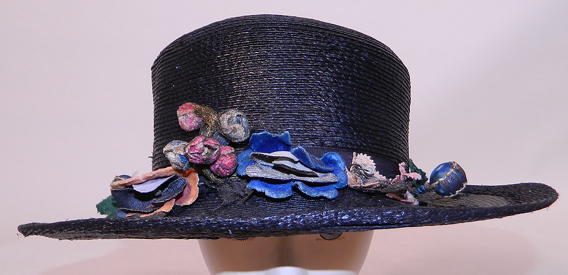 Edwardian Belle Epoque Woven Black Straw Gold Metallic Floral Trim Wide Brim Hat
It is made of a tightly woven black straw, with colorful silk velvet, gold metallic flower leaf trim on the front ribbon hatband.