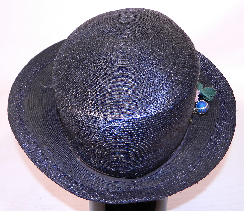 Edwardian Belle Epoque Woven Black Straw Gold Metallic Floral Trim Wide Brim Hat
It is in excellent condition and has never been worn. 