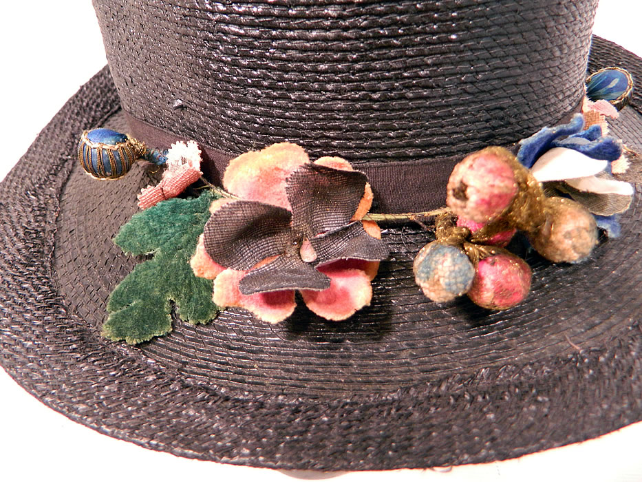 Edwardian Belle Epoque Woven Black Straw Gold Metallic Floral Trim Wide Brim Hat
The hat measures 23 inches inside crown circumference and is 40 inches outside the brim.