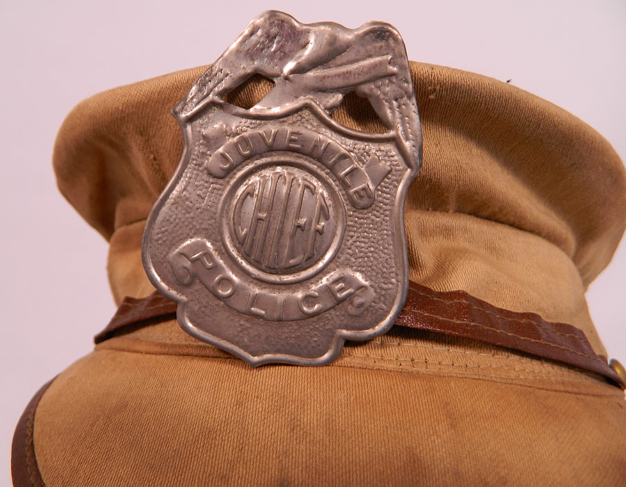 Vintage Childrens Juvenile Police Chief Toy Tin Badge Cap Hat & Motorcycle Goggles
The hat measures 19 inches inside crown circumference. 