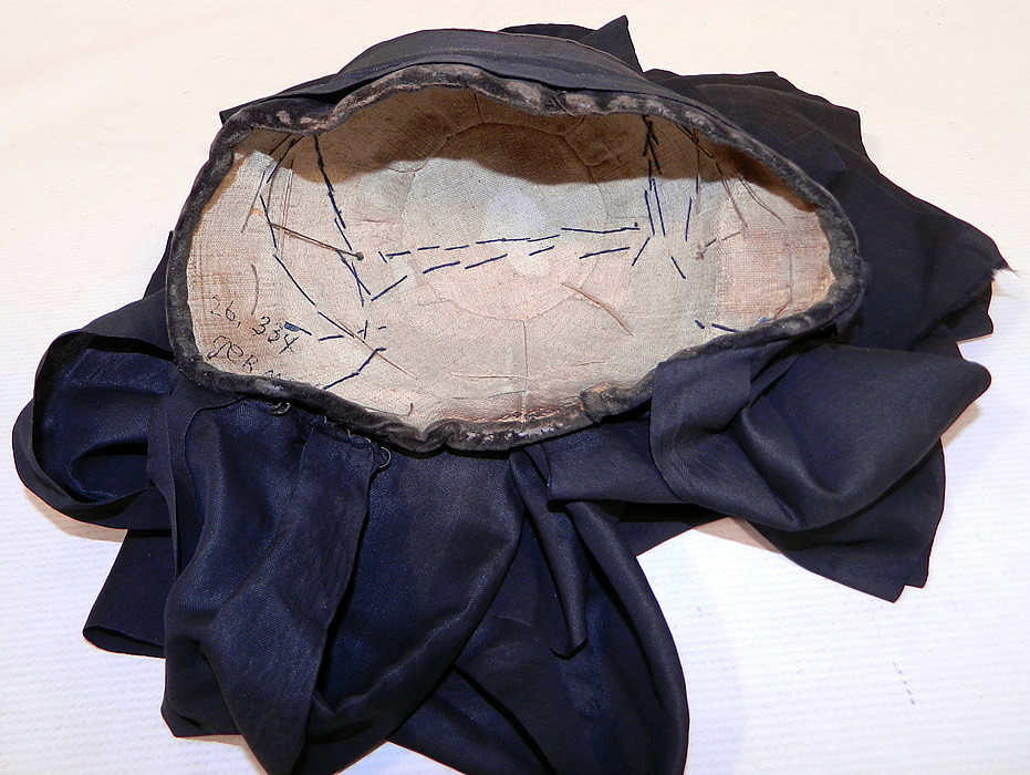 Antique Black Silk Ribbon Bow Bavarian German Folk Bonnet Mourning Hat
The beautiful bonnet measures 20 inches in circumference and has 40 inch long ribbons. It is in good condition, with only some minor wear around the velvet fabric trim base. This is a truly a rare and wonderful piece of early German regional textile folk art! 