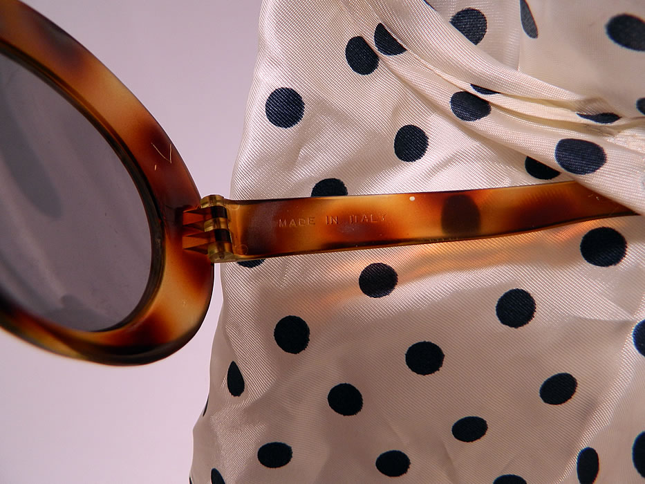 Vintage Audrey Hepburn Style Italian Polka Dot Headscarf Headband & Sunglasses
This classic Audrey Hepburn style silk headscarf has faux tortoise shell round frame sunglasses stamped "Made in Italy" inside creating an iconic look taken straight from the film "Charade".