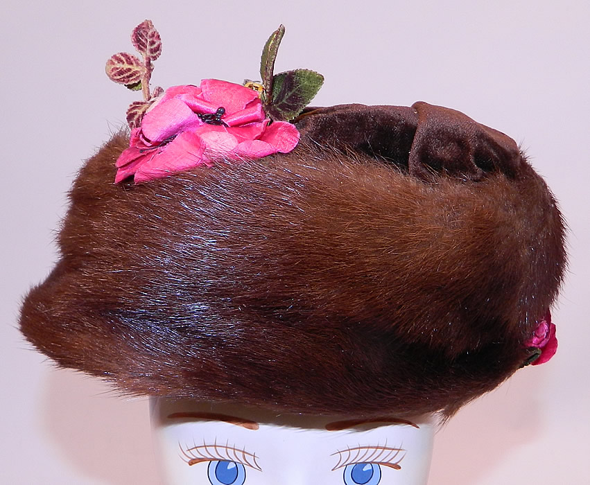 Titanic Edwardian Brown Velvet Mink Fur Floral Trim Toque Traveling Winter Hat
This antique Edwardian Titanic era brown velvet mink fur floral trim toque traveling winter hat dates from 1912. It is made of a dark chocolate brown color velvet fabric, with brown mink fur and pink silk flower trim. 
