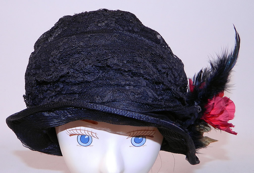 Vintage  Black Woven Straw Silk Lace Red Flower Feather Trim Flapper Cloche Hat
This vintage black woven straw, silk, lace red flower feather trim flapper cloche hat dates from the 1920s.