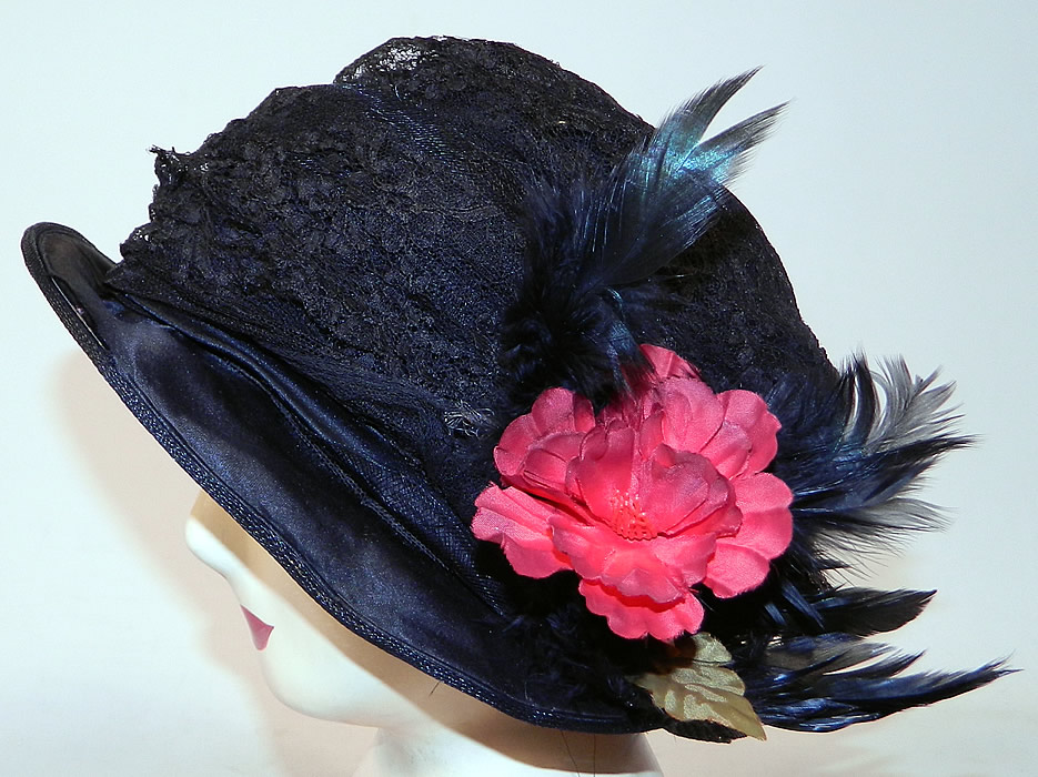 Vintage  Black Woven Straw Silk Lace Red Flower Feather Trim Flapper Cloche Hat
The hat is made of black woven horse hair and straw base, with black silk trim edging the outer brim and a sheer black lace fabric covering the crown. 