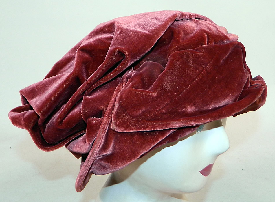 Vintage Art Deco Burgundy Red Silk Velvet Wrapped Turban Toque  Cloche Hat
This vintage Art Deco burgundy red silk velvet wrapped turban toque cloche hat dates from the 1920s. 
