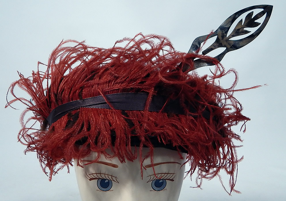 Vintage McGrath Millinery Belle Epoque Burgundy Velvet Feather Trim Toque Hat
This vintage McGrath Millinery Belle Epoque burgundy velvet feather trim toque hat and pin dates from 1915.