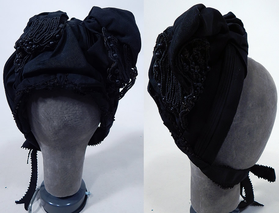 Victorian Black Silk Grosgrain Jet Beaded Trim Mourning Bonnet Hat
The bonnet measures 16 inches around the face and 6 inches long on the back. It is in good condition, with only a few loose missing beads. This is truly a wonderful piece of wearable antique Victoriana millinery art!