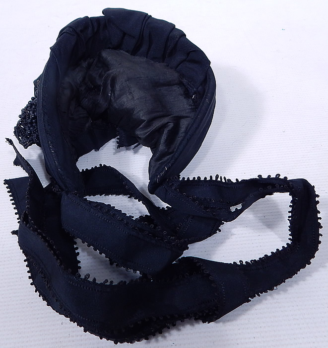 Victorian Black Silk Grosgrain Jet Beaded Trim Mourning Bonnet Hat
This beautiful bonnet has black silk ribbon ties for securing under the chin and is fully lined inside. 