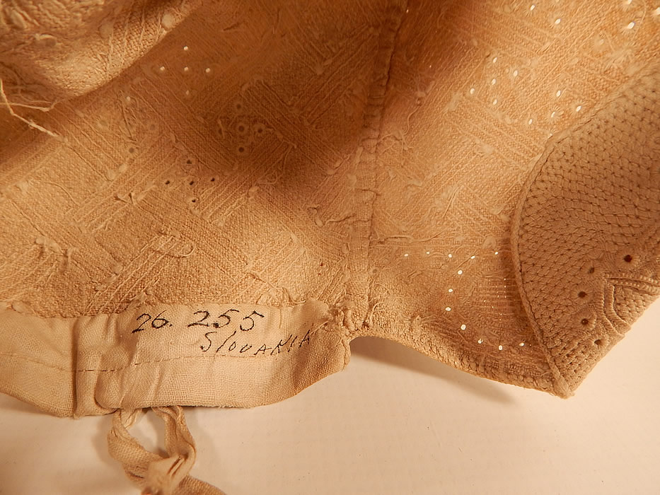 19th Century Antique Linen Quilted Embroidered Slovakia Folk Bonnet Cap Hat
This traditional regional ethnic European Slovakian folk costume skull cap bonnet is a museum deaccession marked inside Slovakia with a numbered tag sewn inside. 