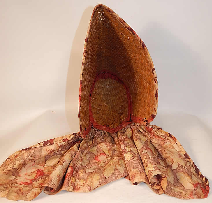 Victorian Womens Woven Natural Straw Chintz Curtain Sunbonnet Sunhat Bonnet
It is unlined and has no front tie closures. The bonnet measures 7 inches long, with an additional 9 inch long fabric flounce back and is 12 inches deep. 