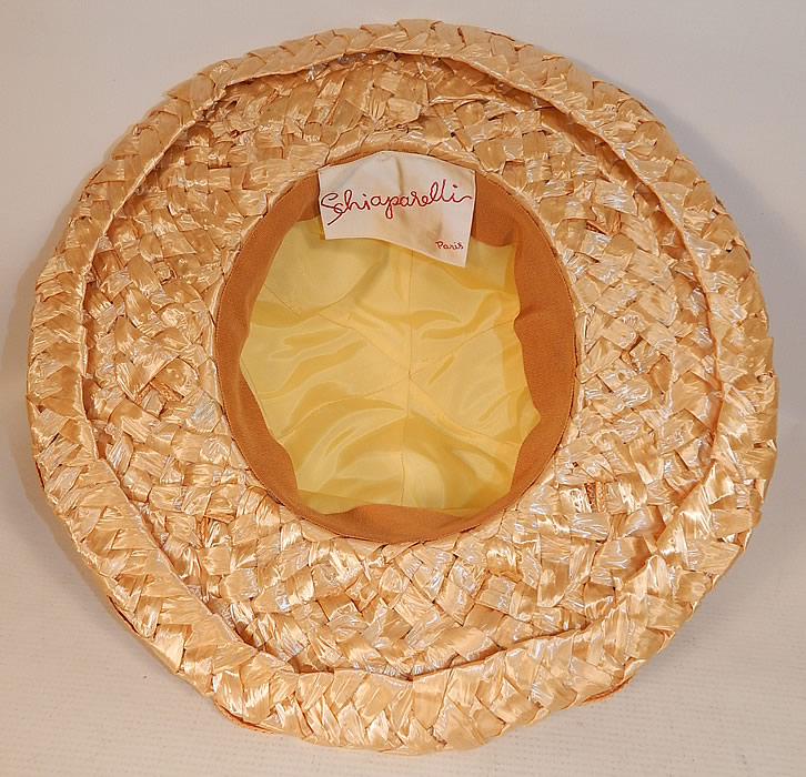 Vintage Schiaparelli Paris Yellow Orange Silk Woven Natural Straw Raffia Wide Brim Hat
It is in excellent condition. This is truly a wonderful piece of wearable designer millinery art!
