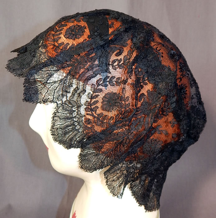 Victorian Civil War Era Antique Black Chantilly Lace Bed Cap Morning Bonnet Hat
It is made of a sheer fine black net Chantilly lace, with a floral garland wreath pattern outlined in black threads, with detailed shading effects, a beautiful decorative scalloped border edging encircling the head and an embroidered net top crown. 