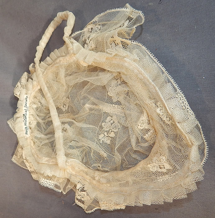 Victorian Civil War Era Antique Cream Net Lace Bed Cap Morning Bonnet Hat
The cap measures 20 inches in circumference, with a 12 1/2 inch long chin strap.