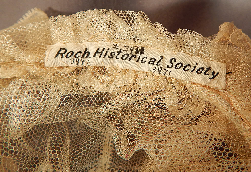 Victorian Civil War Era Antique Cream Net Lace Bed Cap Morning Bonnet Hat
It is in good condition, with only a few tiny pin holes in the net lace. The bonnet is a museum deaccession piece from the Rochester Historical Society (see closeup of labeled tag inside). This is truly a wonderful piece of wearable antique early Victoriana lace art! 