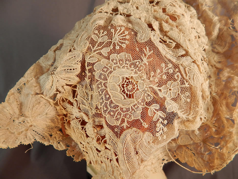 Antique Hand Made Brussels Point de Gaze Duchesse Bobbin Lace Bridal Wedding Hat
This beautiful bridal wedding cap hat has a tiara crown wired brim style, with a draped curtain back, small hair comb attached at the top and is lined in a sheer tulle net. 
