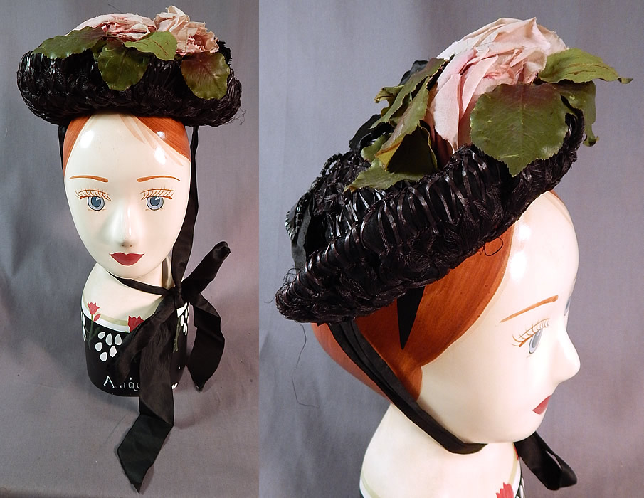 Victorian Woven Black Straw Pink Roses Jet Beaded Buckle Trim Bonnet Hat
This antique Victorian era woven black straw, pink roses, jet beaded buckle trim bonnet hat dates from the 1880s. It is made of a black silk fabric covered with a black woven straw and has a black, pink silk rose flower trim on top.