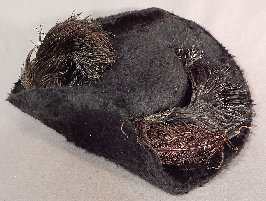 Edwardian Titanic Black Beaver Felt Fur Feather Large Wide Upturned Brim Tricorn Hat
This antique Titanic Edwardian era black beaver felt fur feather large wide upturned brim tricorn hat dates from 1912. 