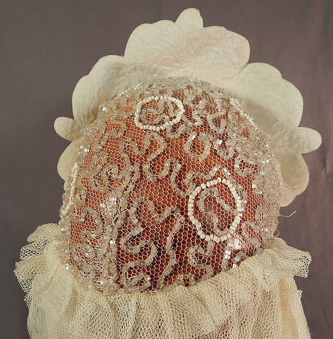 Vintage Rhinestone Beaded Tiara Crown Bridal Wedding Headpiece Juliet Cap
The crown measures 3 inches tall, 13 inches around, the cap is 22 inches in circumference and tulle veil is 11 inches long in back. It is in good as-is condition, with the veil appearing to have been cut off and shortened, also a bit loose coming detached from the cap. This is truly a wonderful wedding headpiece and piece of antique bridal textile millinery art! 