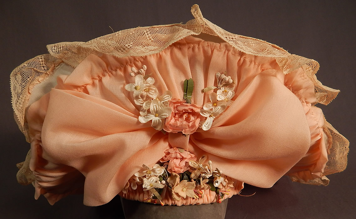 Victorian Style Ruth Stockley Society Silk Embroidery Floral Peach Bonnet Hat
The hat measures 22 inches inside crown circumference, with a 4 inch wide brim. It is in excellent condition. 