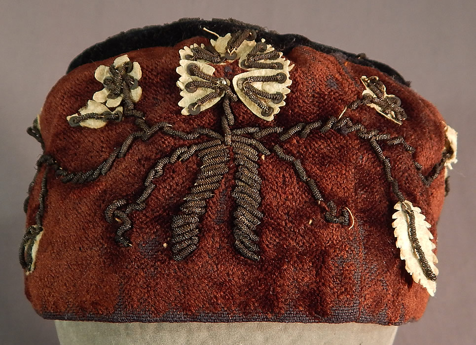 Victorian Gold Bullion Embroidered Brown Velvet Gentlemens Smoking Cap
This antique Victorian Civil War era gentlemen's gold bullion embroidered brown velvet smoking cap dates from the 1860s.