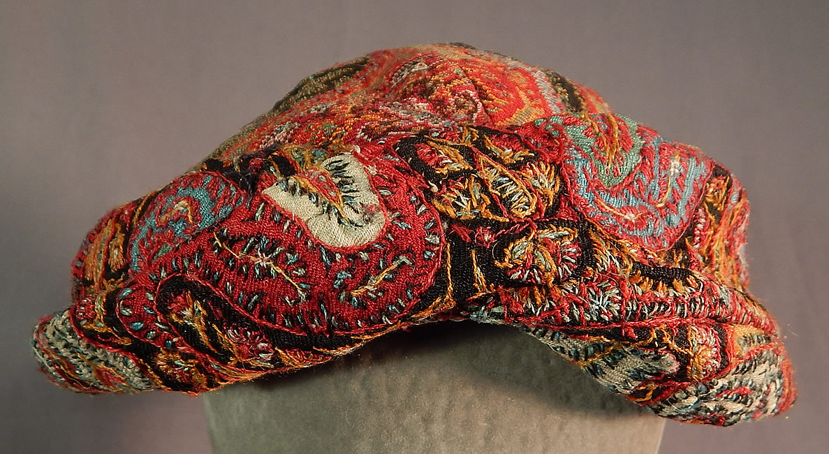 Vintage Lilian Deyber Antique Embroidered Kashmir Wool Paisley Turban Hat
It is made of an antique 19th century jacquard hand loomed woven wool paisley with hand embroidered Kashmir wool pieced patchwork border trim along the brim. 