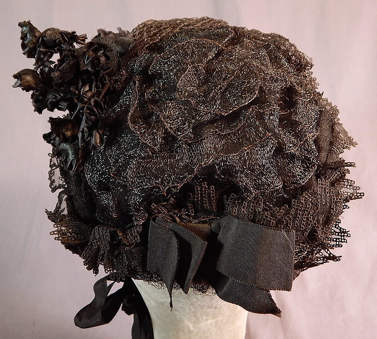 Victorian Black Woven Straw Lace Net Flowers Full Mourning Bonnet Hat
The bonnet measures 8 by 8 inches and is 26 inches in circumference.