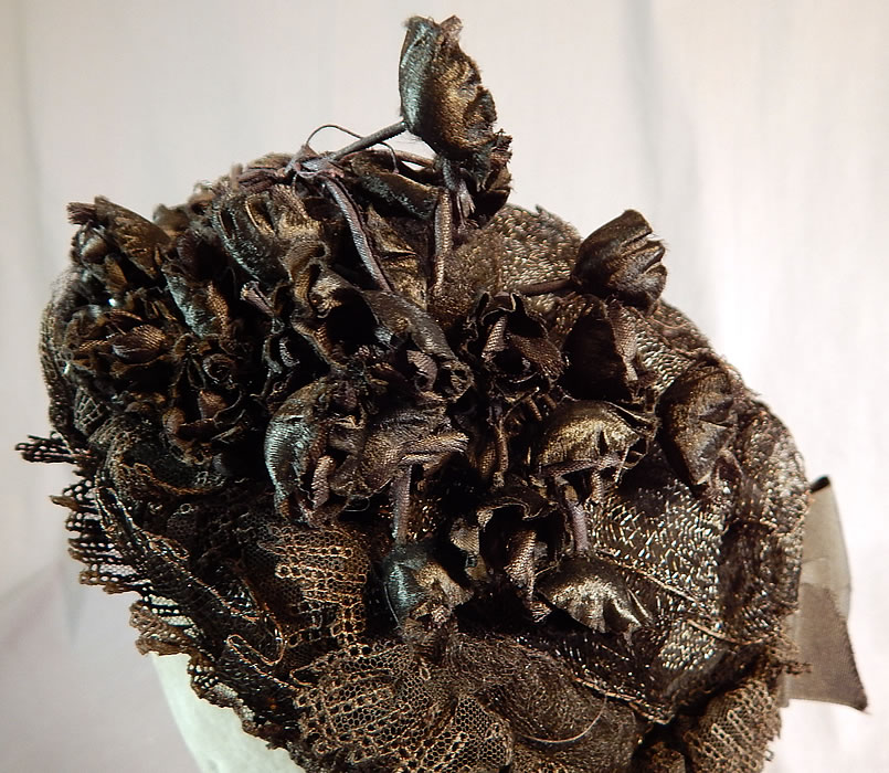 Victorian Black Woven Straw Lace Net Flowers Full Mourning Bonnet Hat
It is in good condition, with only some fraying along the black silk ribbon ties. This is truly a wonderful piece of wearable Victoriana mourning millinery art!