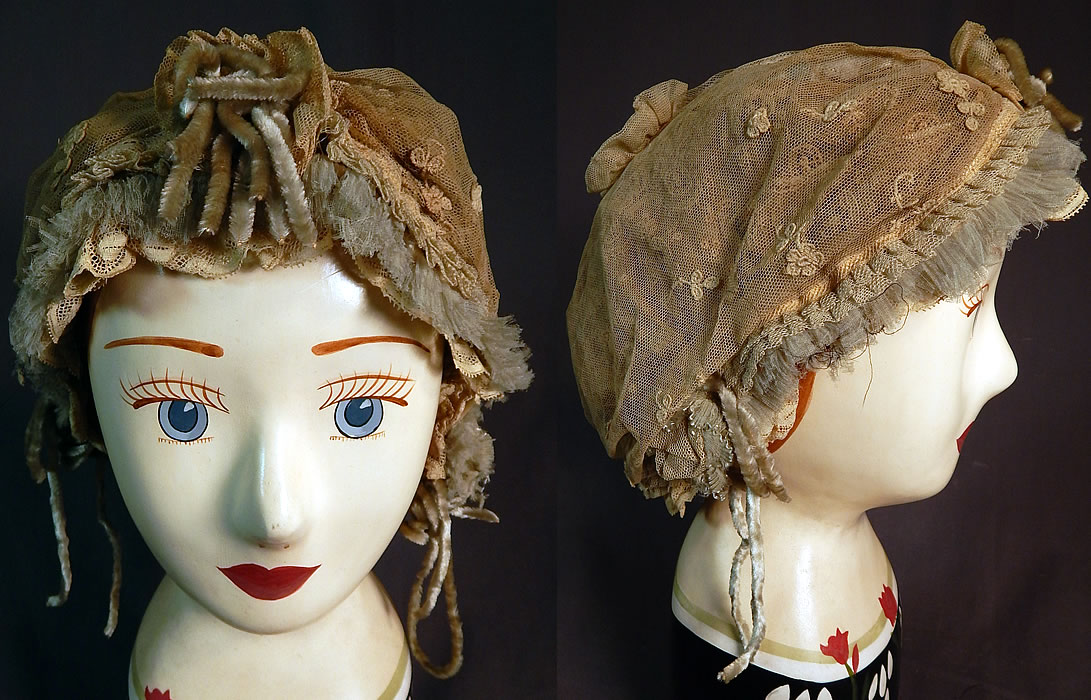 Victorian Cream Tulle Net Lace Blue Silk Chenille Trim Bed Cap Bonnet Hat
This antique Victorian era cream tulle net lace blue silk chenille trim bed cap bonnet hat dates from 1890. It is made of a pale pastel blue silk fabric covered with layers of cream color lace and sheer tulle net fabric.