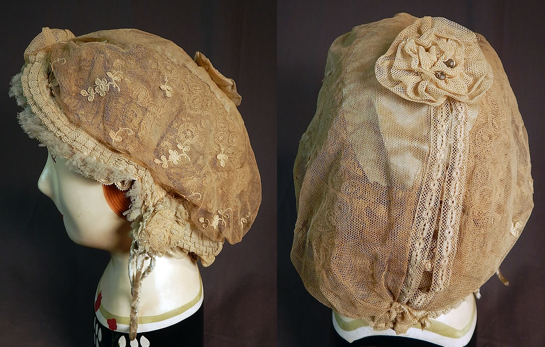 Victorian Cream Tulle Net Lace Blue Silk Chenille Trim Bed Cap Bonnet Hat
There are pale blue silk chenille fringe trim on the front and hanging down the sides. It appears to be home made of a variety of lace pieces and trims patchwork put together and created into a cap.