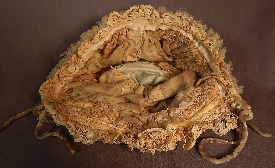 Victorian Cream Tulle Net Lace Blue Silk Chenille Trim Bed Cap Bonnet Hat
The cap measures 24 inches inside circumference.