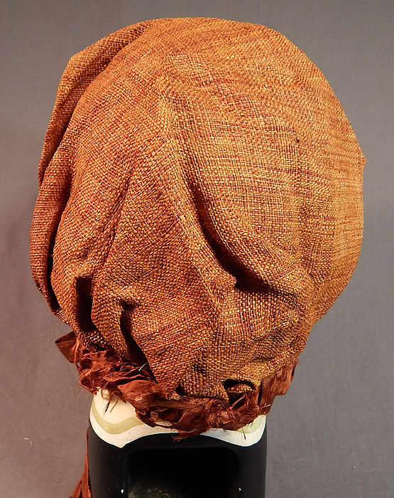 Victorian Woven Brown Straw Chintz Fabric Trim Calash Sun Bonnet Hood Hat
The bonnet measures 26 inches around the front opening, is 11 inches wide along the front and is 11 inches high.