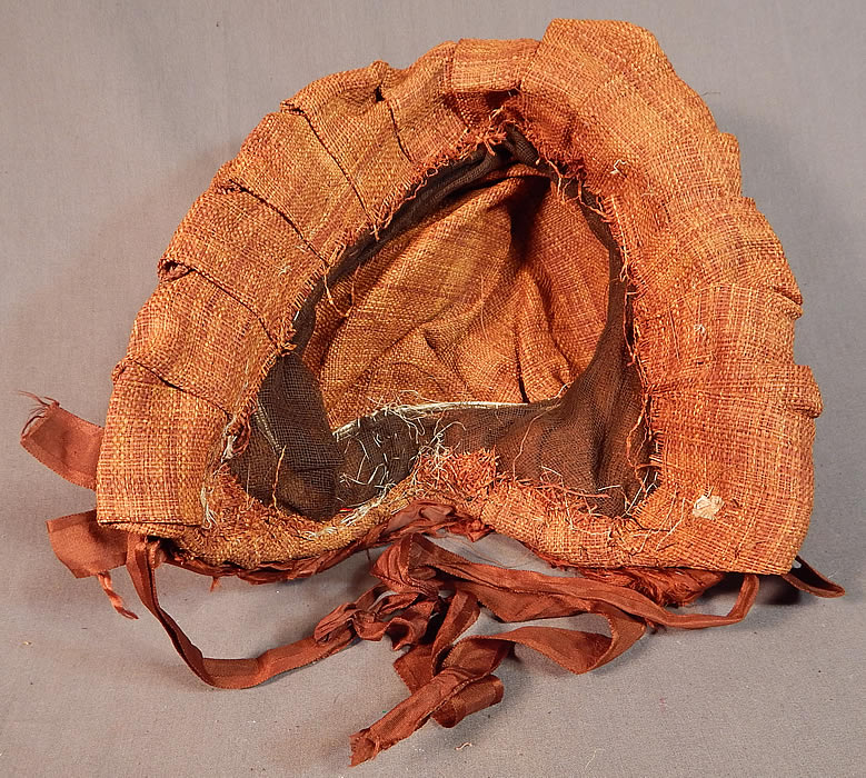 Victorian Woven Brown Straw Chintz Fabric Trim Calash Sun Bonnet Hood Hat
It is in good as-is condition, with frayed splits along the brown silk fabric back drape and is missing the inside lining. 