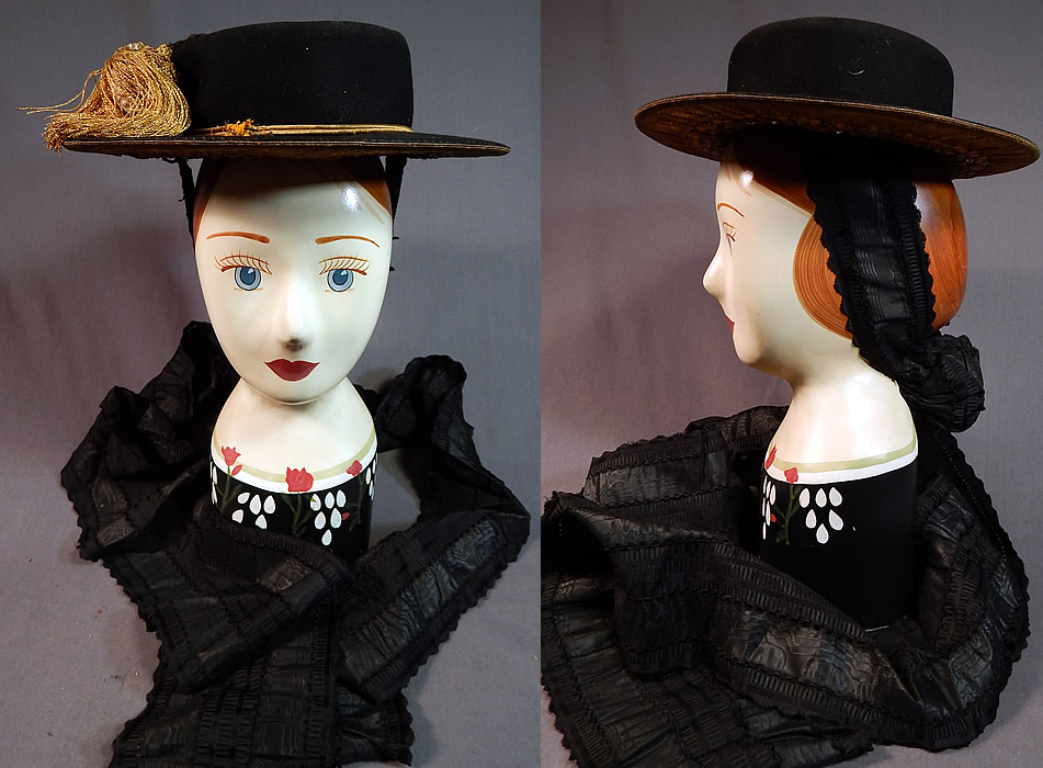 Antique Gold Bullion Embroidered Tracht Bavarian German Austrian Folk Costume Hat
It is made of a black wool felt fabric, with gold bullion raised embroidery work accented with gold metal prong set rhinestones and gold lam&eacute; damask weave ribbon trim edging under the brim.