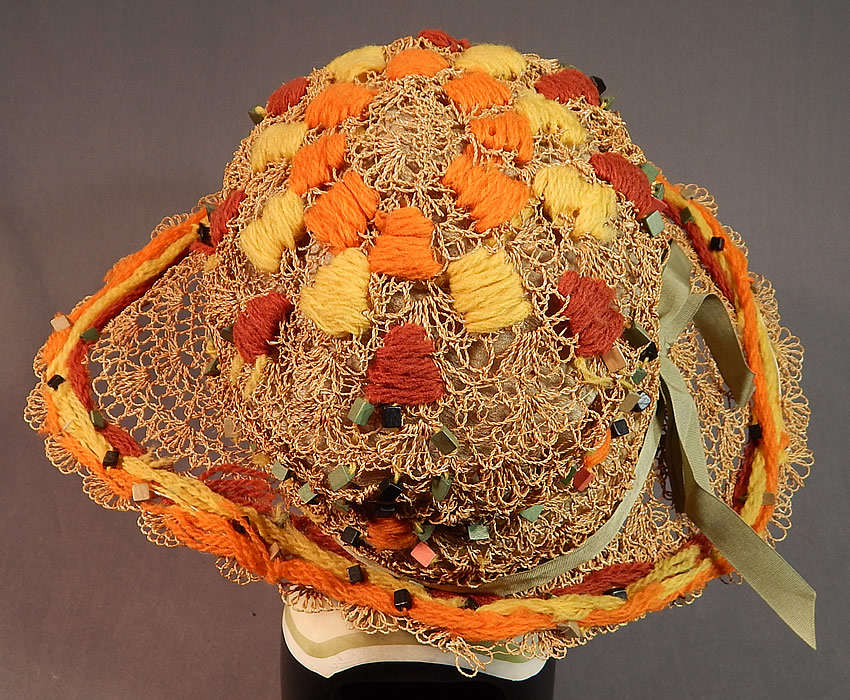 Vintage Woven Natural Straw Colorful Wood Beaded Embroidered Yarn Wide Brim Cloche Hat
The hat measures 15 inches across the brim and has a 22 inches inside crown circumference.
