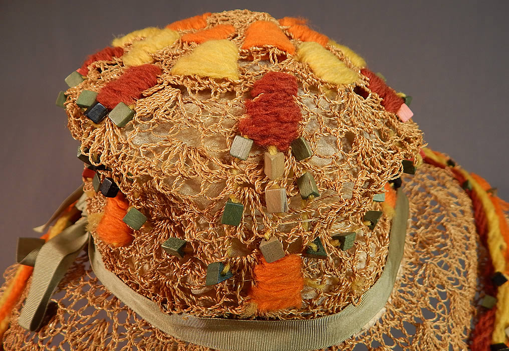 Vintage Woven Natural Straw Colorful Wood Beaded Embroidered Yarn Wide Brim Cloche Hat
This is truly a wonderful piece of quality made wearable Art Deco textile millinery art!