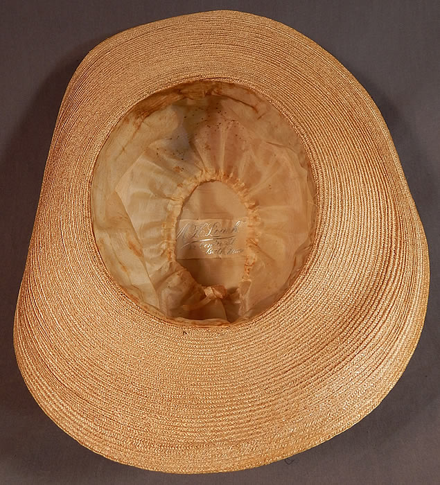 Vintage M. H. Loach Natural Woven Straw Green Ribbon Feather Rosette Wide Brim Hat
There is a "M. H. Loach, 22 Centre St. Bath Maine" store label sewn inside. 