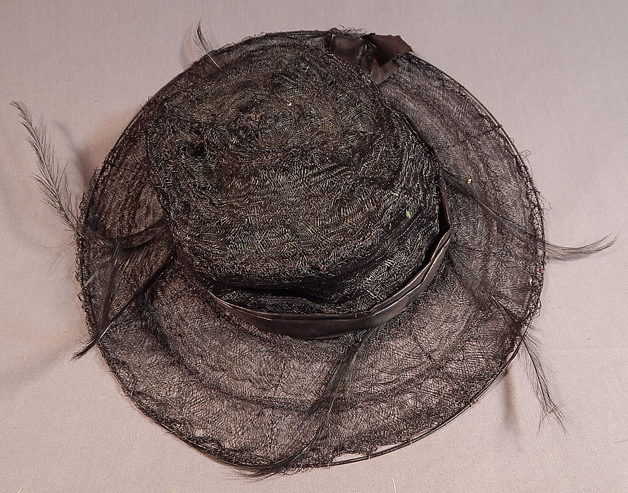 Edwardian Black Woven Horse Hair Crinoline Feather Trim Wired Wide Brim Hat
The hat measures 14 inches wide across the brim, 44 inches in circumference on the outside and has a 22 1/2 inch inside crown circumference. 